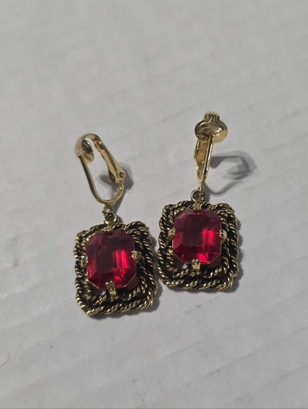 Sarah Coventry Majorca Red Gemstone Gold Tone Scroll Pattern Clip On Earrings
